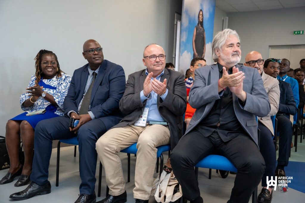 Guests applauding at the AIDA Awards launch in Cotonou